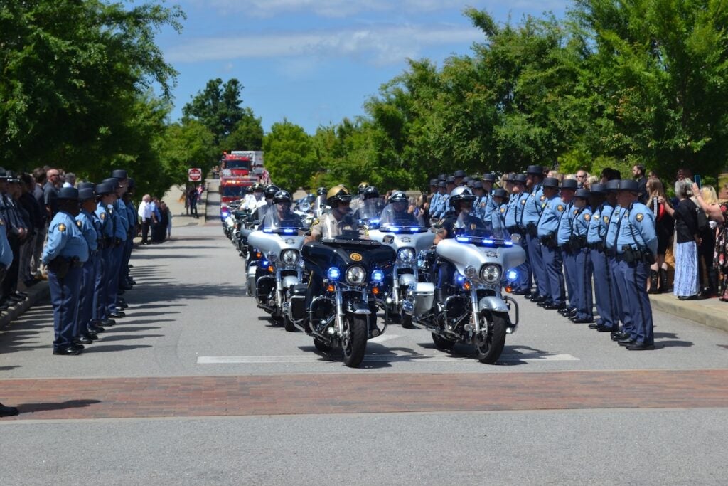 Hundreds of law enforcement officials attended the funeral of Deputy Brandon Sikes on Monday, May 5. Staff photo by Stephanie Hill