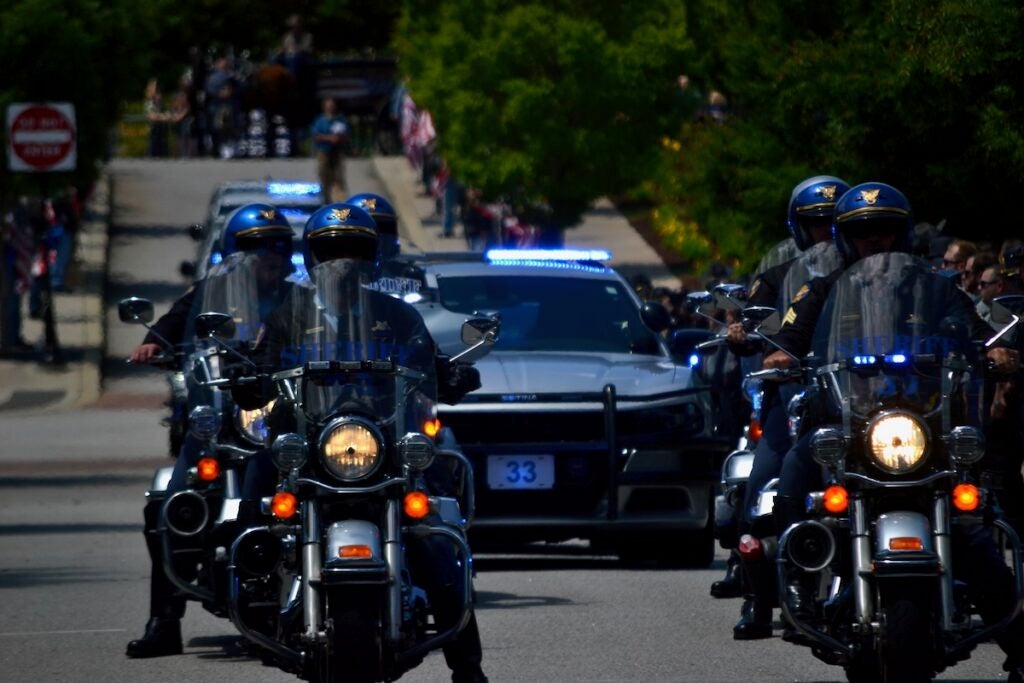 Law enforcement officials escorted the body of Deputy Brandon Sikes to the Performing Arts Center on Monday, May 5. Staff photo by Stephanie Hill
