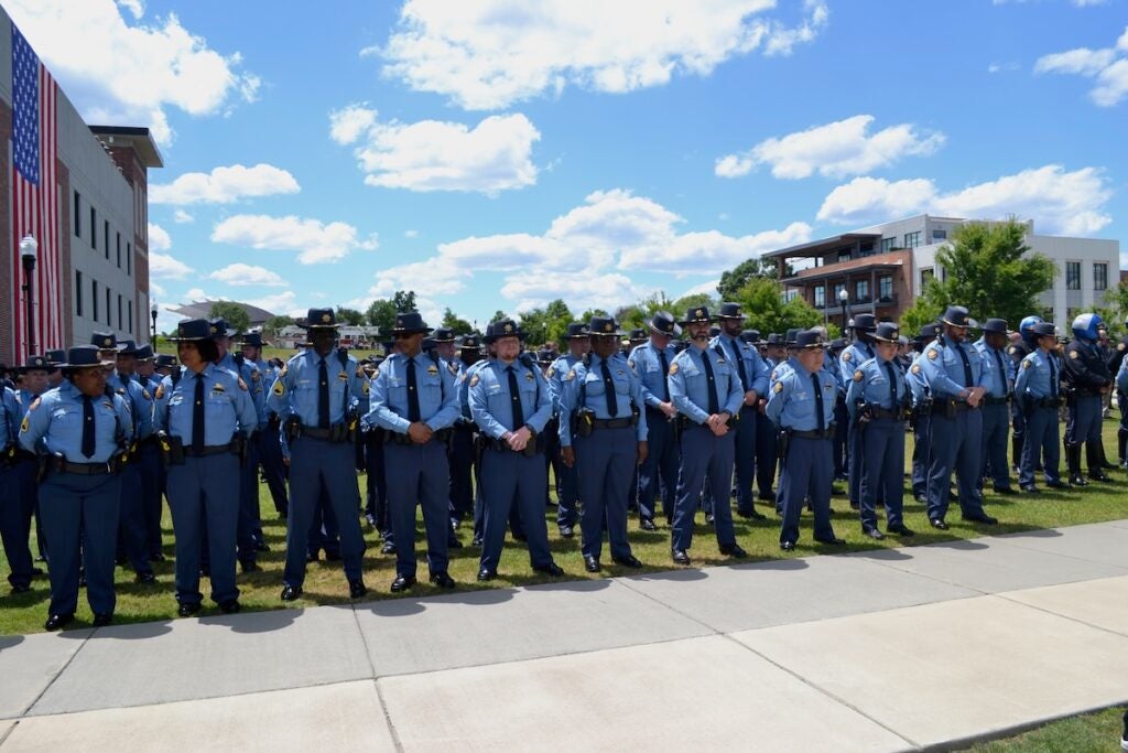 Deputies stand at attention at the funeral of Deputy Brandon Sikes on Monday, May 5. Staff photo by Stephanie Hill