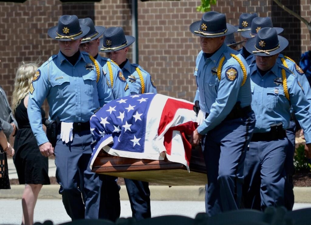 Deputies carry out fallen Deputy Brandon Sikes during his funeral on Monday, May 5. Staff photo by Stephanie Hill