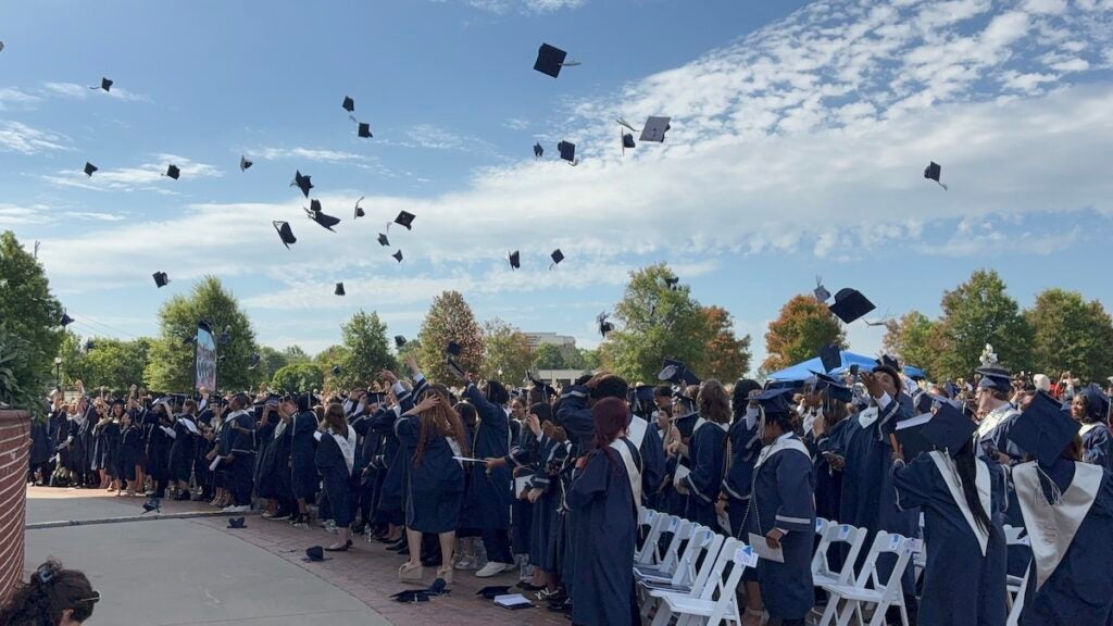 The Grovetown High School class of 2025 tossed their caps in the air at the end of their commencement ceremony. Staff photo by Stephanie Hill