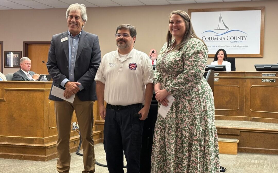 Columbia County Fire Rescue presented checks from the 2025 Boot Drive to Burn Foundation of America and Columbia County Community Connections during the Columbia County Board of Commissioners meeting on Tuesday, June 3. Staff photo by Stephanie Hill