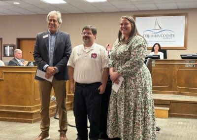 Columbia County Fire Rescue presented checks from the 2025 Boot Drive to Burn Foundation of America and Columbia County Community Connections during the Columbia County Board of Commissioners meeting on Tuesday, June 3. Staff photo by Stephanie Hill