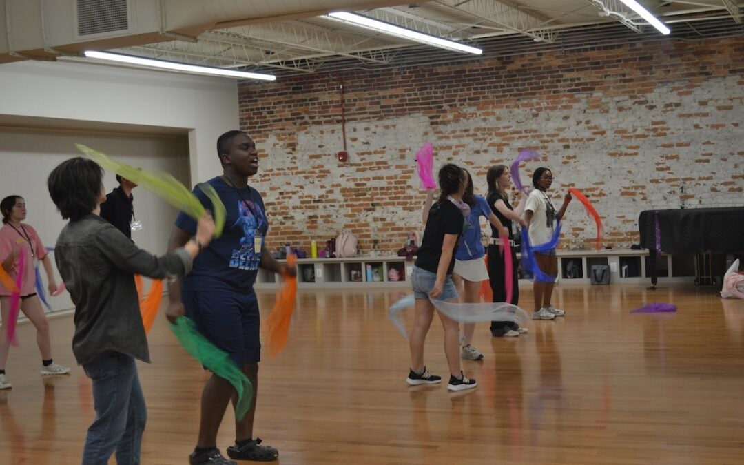 Campers at Camp Wonderland dance with ribbon in one of their classes. Photo by Stephanie Hill