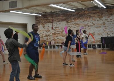 Campers at Camp Wonderland dance with ribbon in one of their classes. Photo by Stephanie Hill