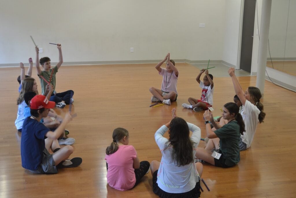 In the music class at Camp Wonderland, students played with different instruments. Staff photo by Stephanie Hill
