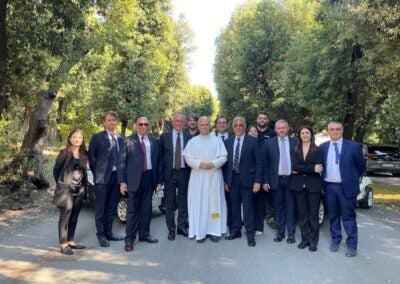 Pope Leo with representatives from Club Car and Exelentia, along with engineers and technicians who worked on the project. Photo courtesy Club Car