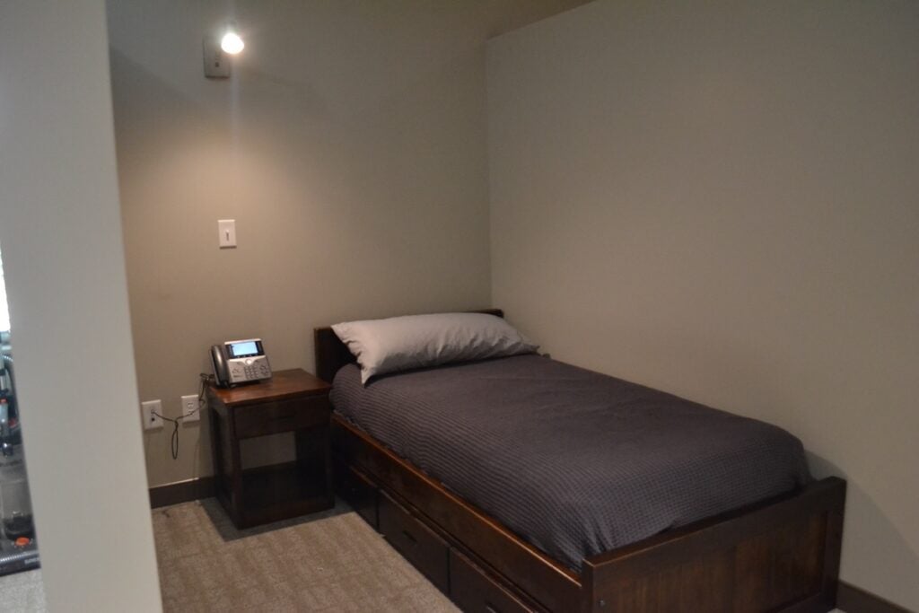 The bunk room at Fire Station 2 has multiple cubicles with sleeping spaces for emergency personnel. Staff photo by Stephanie Hill