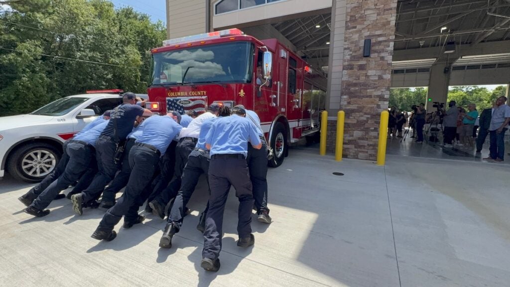 Fire Station 2 personnel push-in the new rescue truck into the building, official putting it in service. Staff photo by Stephanie Hill