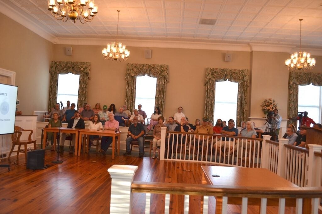 The Appling Courthouse was standing room only on Thursday evening as community members came out for a town hall with Columbia County commissioners Michael Carraway and Alison Couch. The proposed data center dominated the conversation. Staff photo by Stephanie Hill
