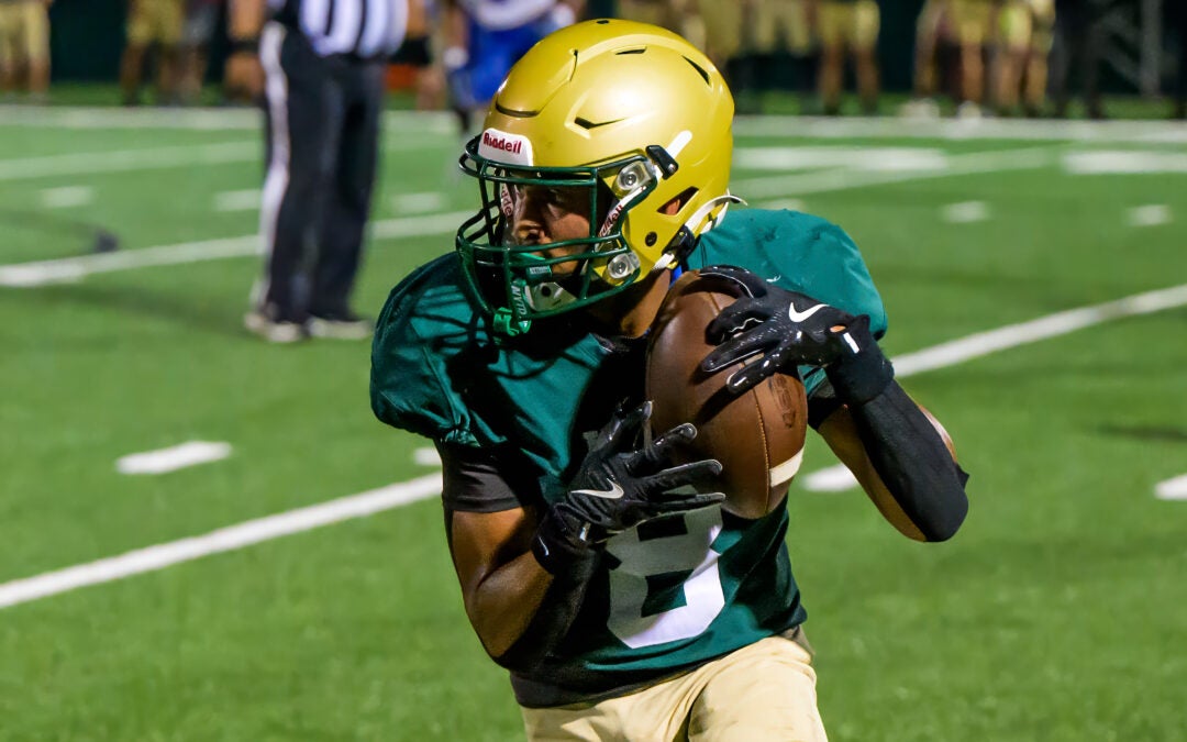 Aquinas receiver Jaelan Gibson (8) runs the ball after catching a pass during a game against Westside in Augusta, Ga., on Friday, September 19, 2025. (photo by Rob Davis)