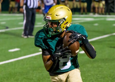 Aquinas receiver Jaelan Gibson (8) runs the ball after catching a pass during a game against Westside in Augusta, Ga., on Friday, September 19, 2025. (photo by Rob Davis)