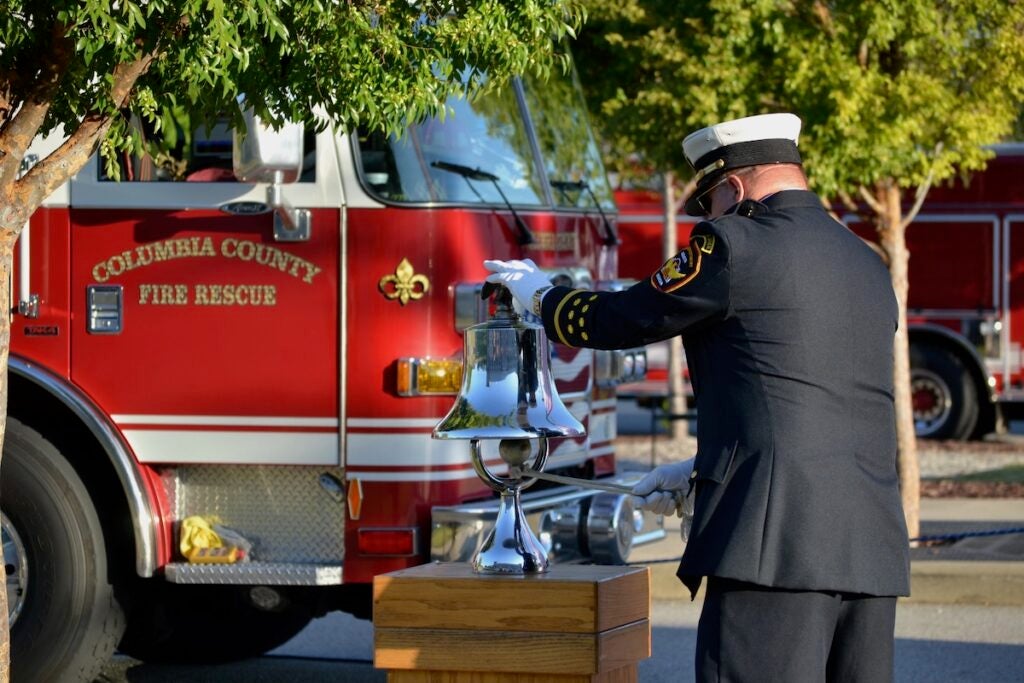 A bell was rung at the 9/11 Memorial Stair Climb and Remembrance Ceremony on Thursday. Staff photo by Stephanie Hill
