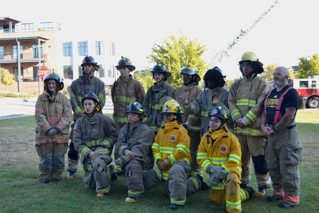 Evans High School students on the firefighter career pathway participated in the stair climb Thursday morning. Staff photo by Stephanie Hill
