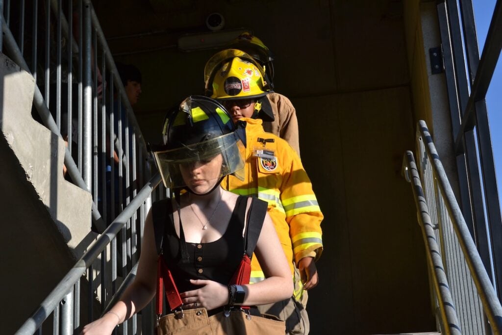 Evans High School students on the firefighter career pathway participated in the stair climb Thursday morning. Staff photo by Stephanie Hill