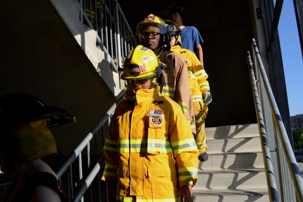 Evans High School students on the firefighter career pathway participated in the stair climb Thursday morning. Staff photo by Stephanie Hill