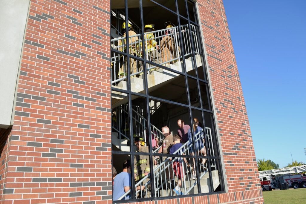 Columbia County Fire Rescue held a stair climb in remembrance of Sept. 11 on Thursday morning. Staff photo by Stephanie Hill