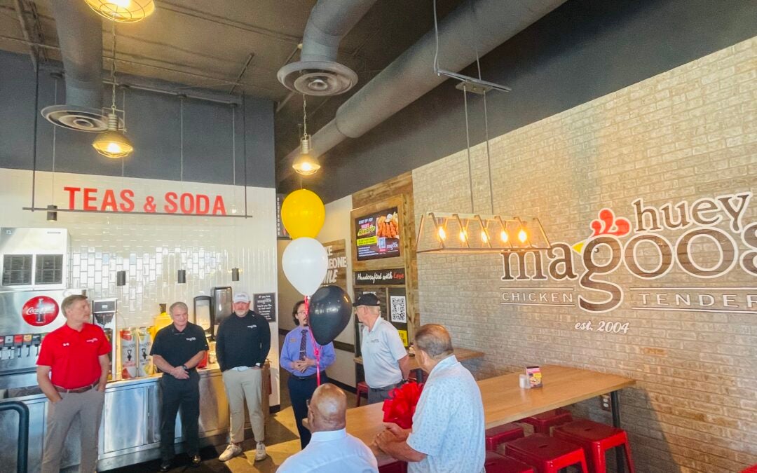 A ribbon cutting was held for Huey Magoo's on Wednesday morning. Staff photo by Skyler Andrews