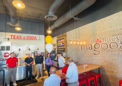 A ribbon cutting was held for Huey Magoo's on Wednesday morning. Staff photo by Skyler Andrews