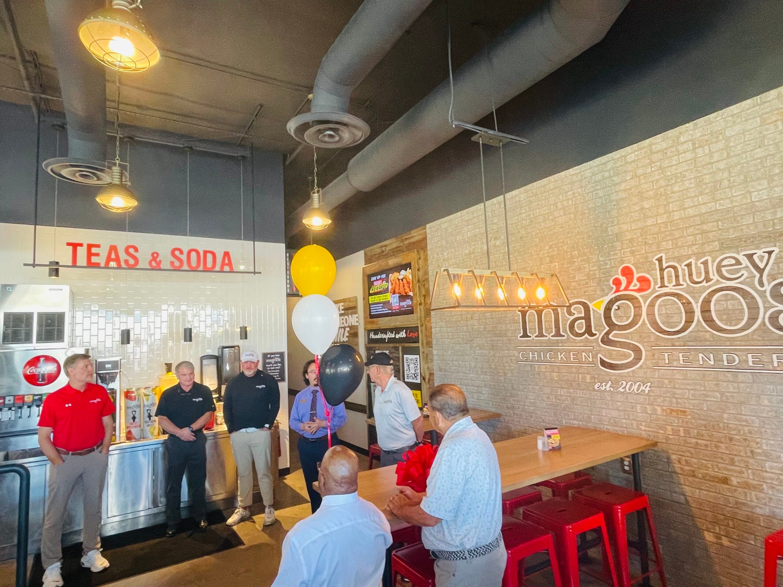 A ribbon cutting was held for Huey Magoo's on Wednesday morning. Staff photo by Skyler Andrews
