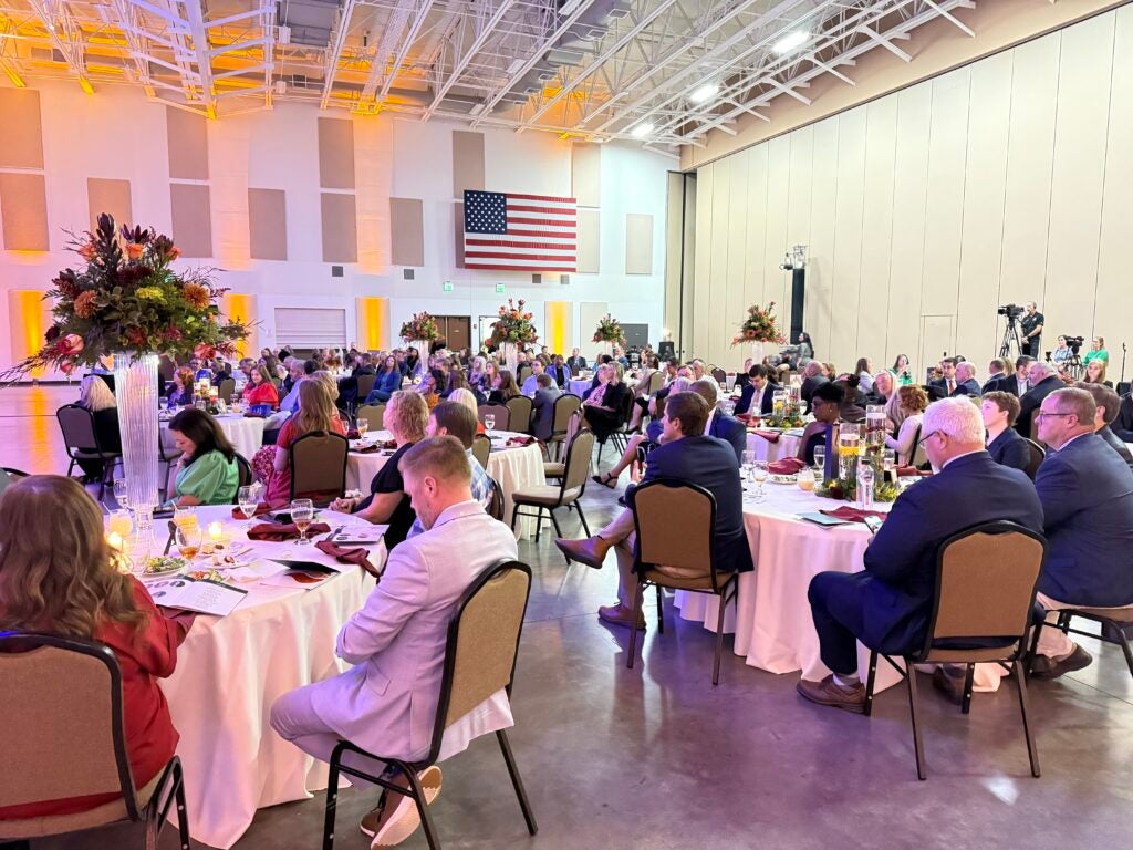 Guests gather at the Columbia County Exhibition Center in Grovetown for the annual Teacher of the Year Celebration on Thursday night. Photo by Drew Wall