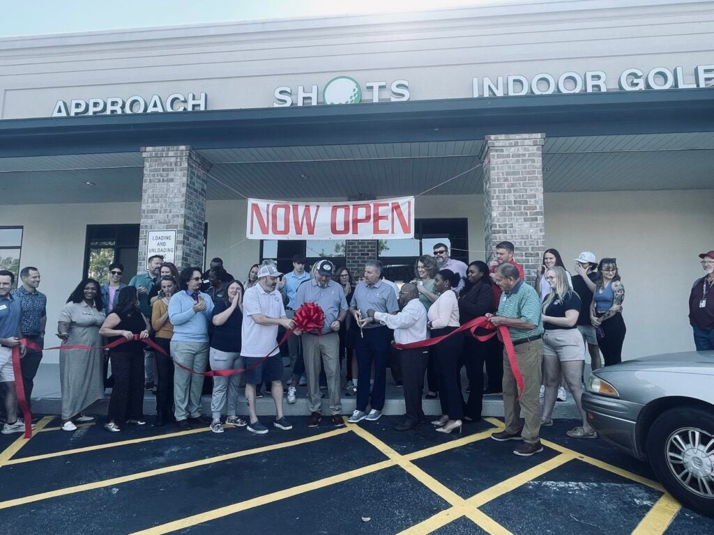Approach Shots Indoor Golf hosted its ribbon cutting ceremony on Wednesday afternoon. Staff photo by Skyler Andrews