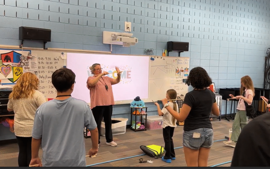 Emphasizing the importance of bow control, CCSD Strings Academy Instructor Ms. Kim Chavous, leads teaches placement and movement of the player’s hand and wrist during the academy’s first beginner-level practice on Monday, October 6, 2025, at Brookwood Elementary School. Photo courtesy of Columbia County.