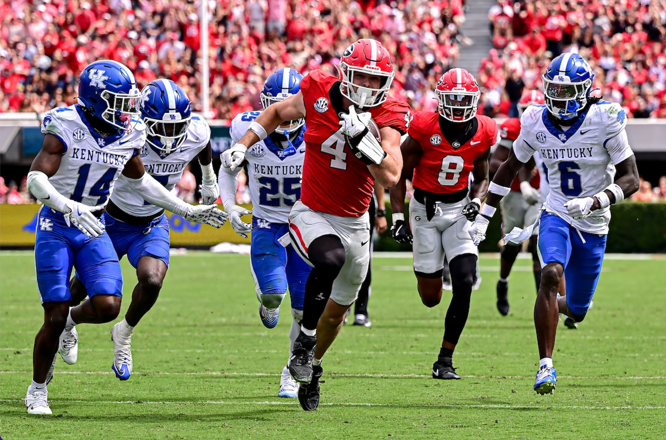 Georgia tight end Oscar Delp (4) runs with ball after a catch during a game against Kentucky at Sanford Stadium in Athens, Ga., on Saturday, October 4, 2025. (photo by Rob Davis)