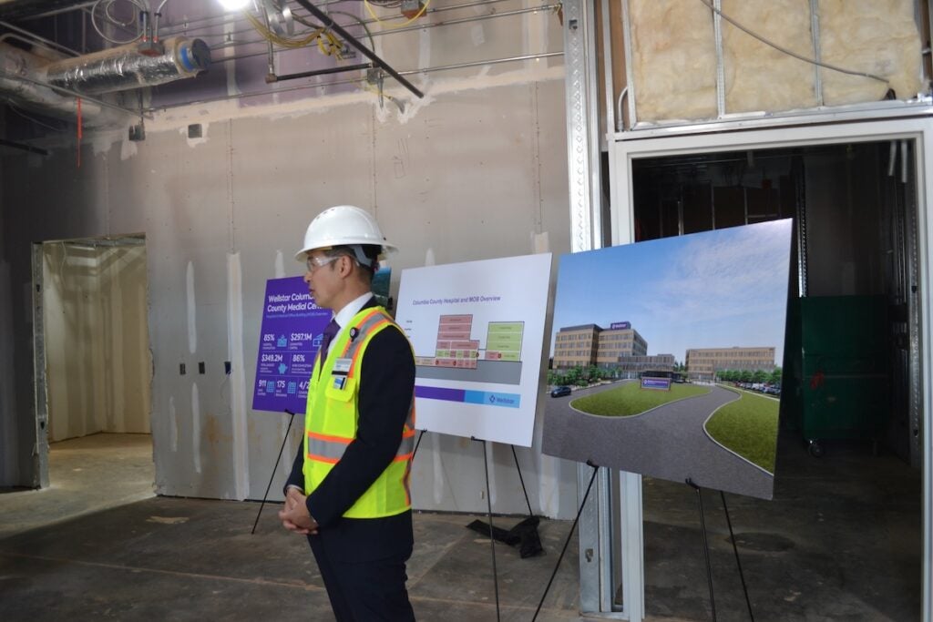 Nelson So,  chief operating officer of the hospital, spoke to members of the media during the hard hat tour on Friday. Staff photo by Stephanie Hill