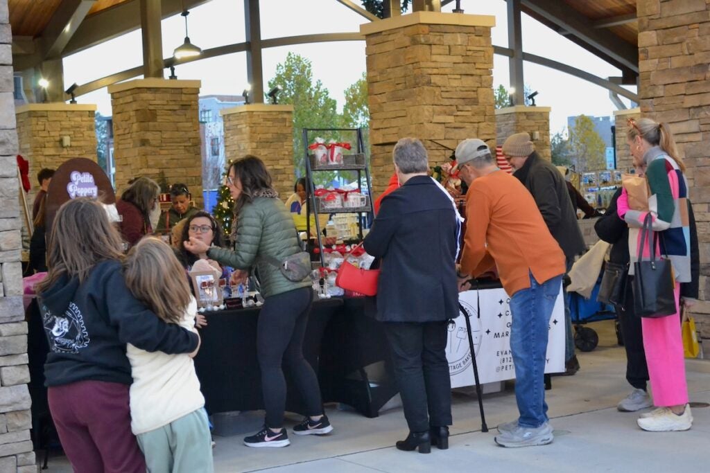 Community members browsed the different booths at the Christmas in Columbia County event on Thursday, Dec. 4. Staff photo by Stephanie Hill
