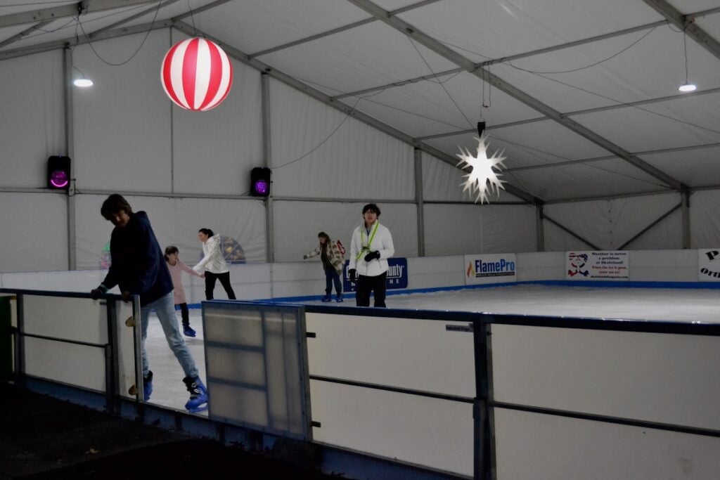 Patrons took to Evans on Ice prior to the Columbia County Christmas tree lighting. Staff photo by Stephanie Hill