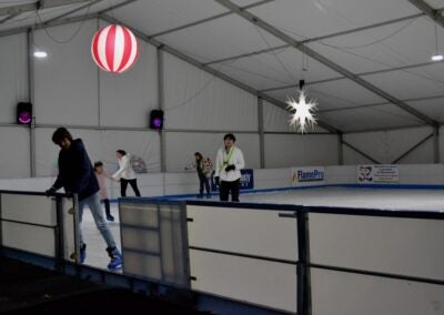Patrons took to Evans on Ice prior to the Columbia County Christmas tree lighting. Staff photo by Stephanie Hill