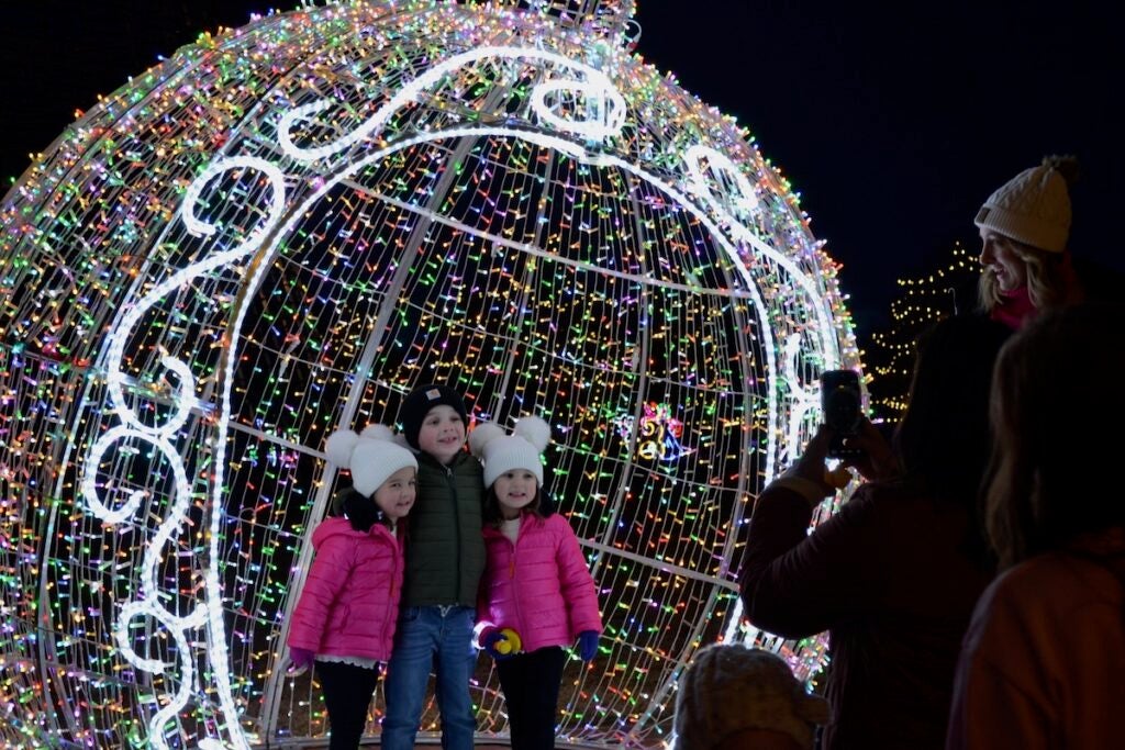 Kids posed in ornaments for pictures for their family members at Evans Towne Center Park. Staff photo by Stephanie Hill
