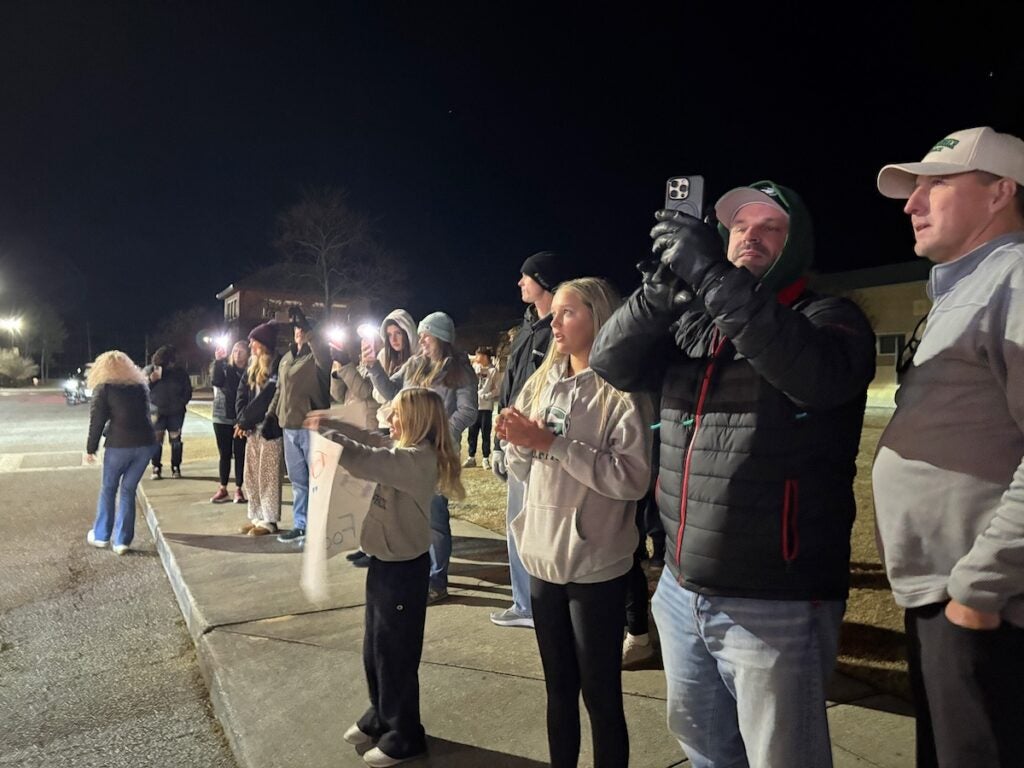 Friends and family of the Greenbrier girls flag team greeted the team when they returned to Greenbrier High School after winning the state championship on Monday. Staff photo by Stephanie Hill