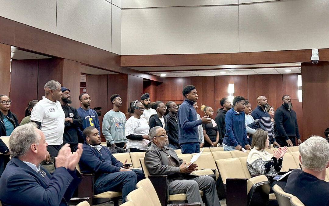 Participants in Augusta's award-winning MACH Academy tennis and youth development program got a round of applause Tuesday as the Augusta Commission approved a budget that eliminated all funding for MACH and numerous other non-government organizations. Staff photo by Susan McCord