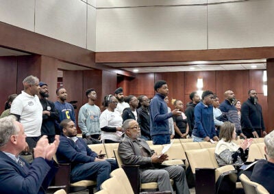 Participants in Augusta's award-winning MACH Academy tennis and youth development program got a round of applause Tuesday as the Augusta Commission approved a budget that eliminated all funding for MACH and numerous other non-government organizations. Staff photo by Susan McCord