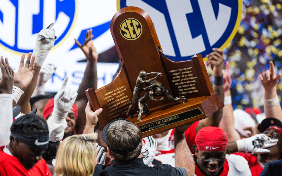 Georgia players celebrate after the Bulldogs defeated Alabama 28-7 in the SEC Football Championship game at the Mercedes-Benz Stadium in Atlanta, Ga., on Saturday, December 6, 2025. (photo by Rob Davis)
