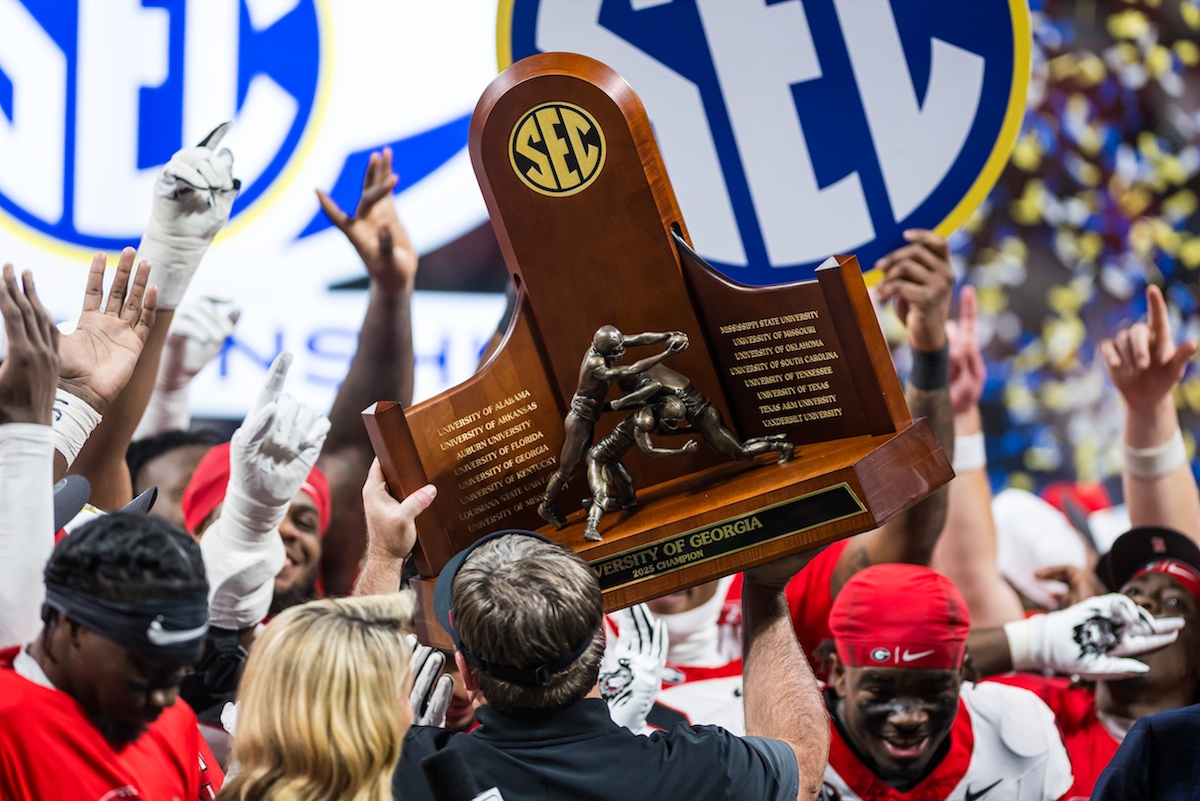 Georgia players celebrate after the Bulldogs defeated Alabama 28-7 in the SEC Football Championship game at the Mercedes-Benz Stadium in Atlanta, Ga., on Saturday, December 6, 2025. (photo by Rob Davis)