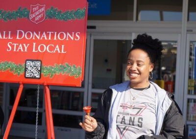 A Salvation Army bell ringer collects donations outside an Augusta Walmart. Photo courtesy Salvation Army