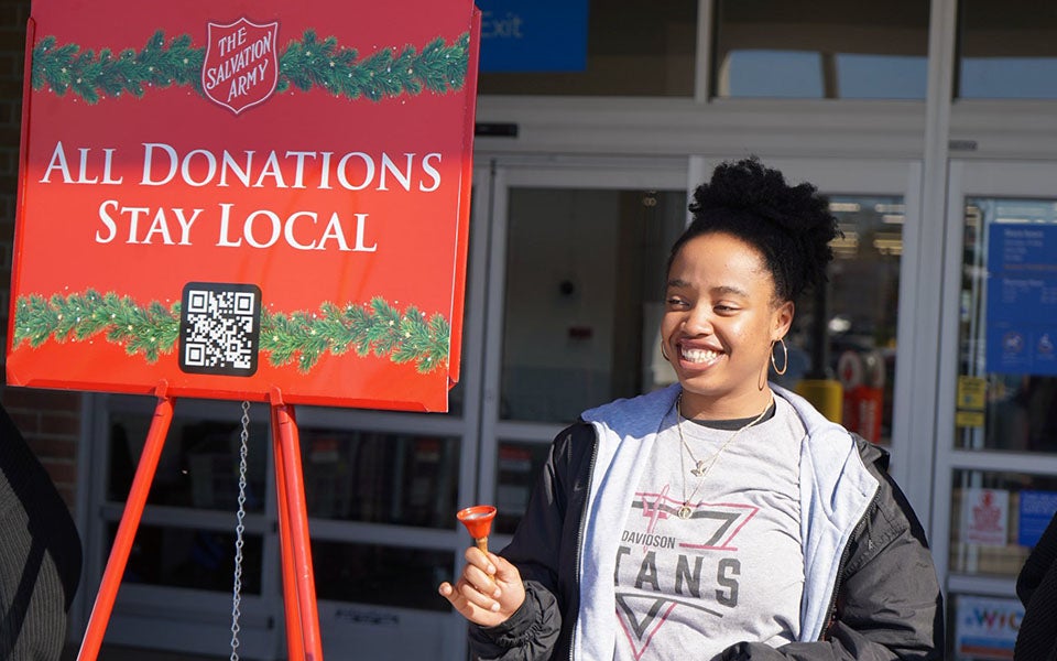 A Salvation Army bell ringer collects donations outside an Augusta Walmart. Photo courtesy Salvation Army