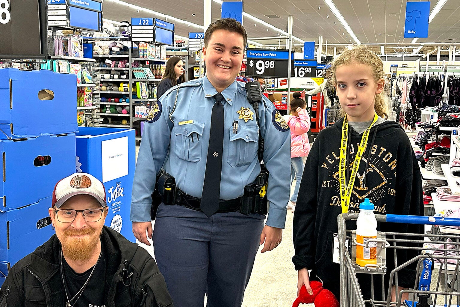 Columbia County Sheriff's Office "Day with a Deputy" saw area law enforcement take 50 kids shopping Tuesday. Staff photo by Susan McCord