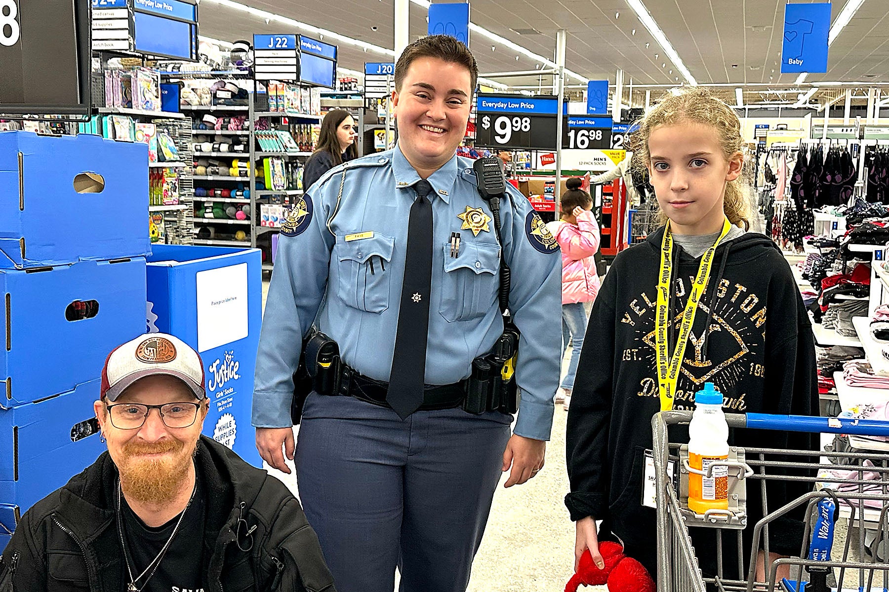Columbia County Sheriff's Office "Day with a Deputy" saw area law enforcement take 50 kids shopping Tuesday. Staff photo by Susan McCord