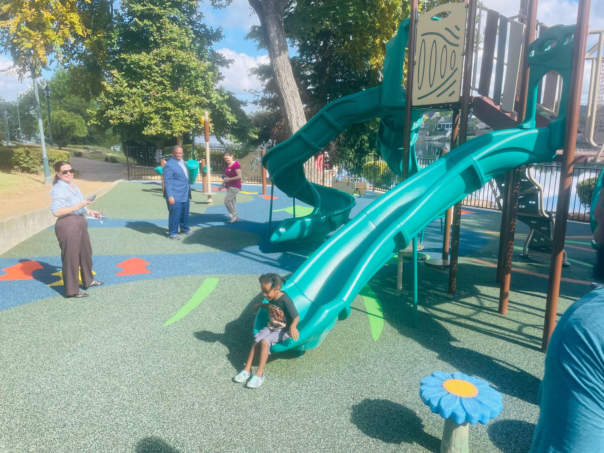 Recs and Park celebrates reopening of playground at Riverwalk